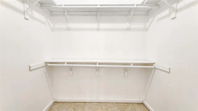 a view of a room with racks on the wall