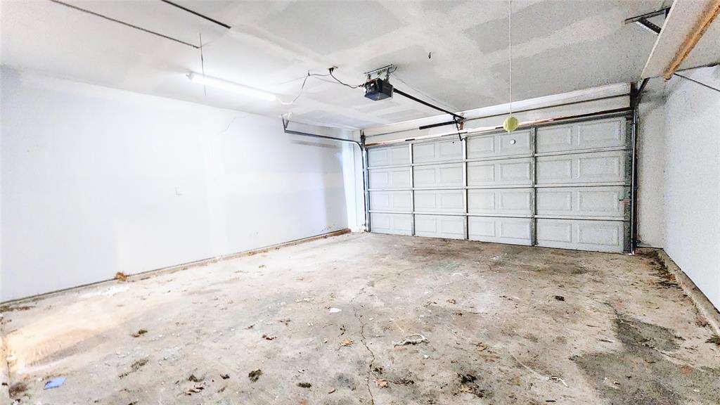 3905 Windflower Lane Fort Worth, TX 76137 - Photo 31 of 32 a view of a garage