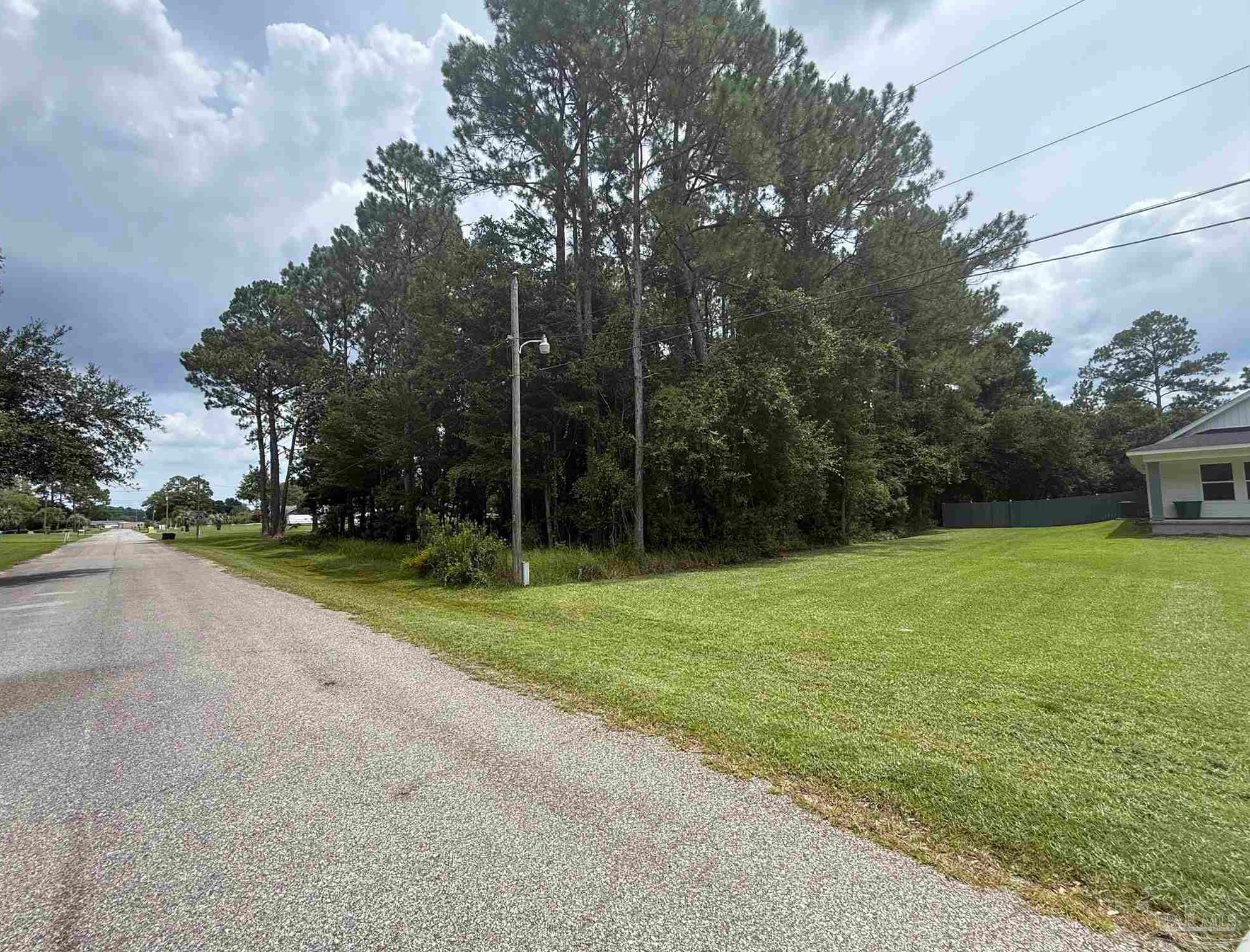 8100 Pond Valley Drive Pensacola, FL 32506 - Photo 2 of 4 a view of a park with large trees