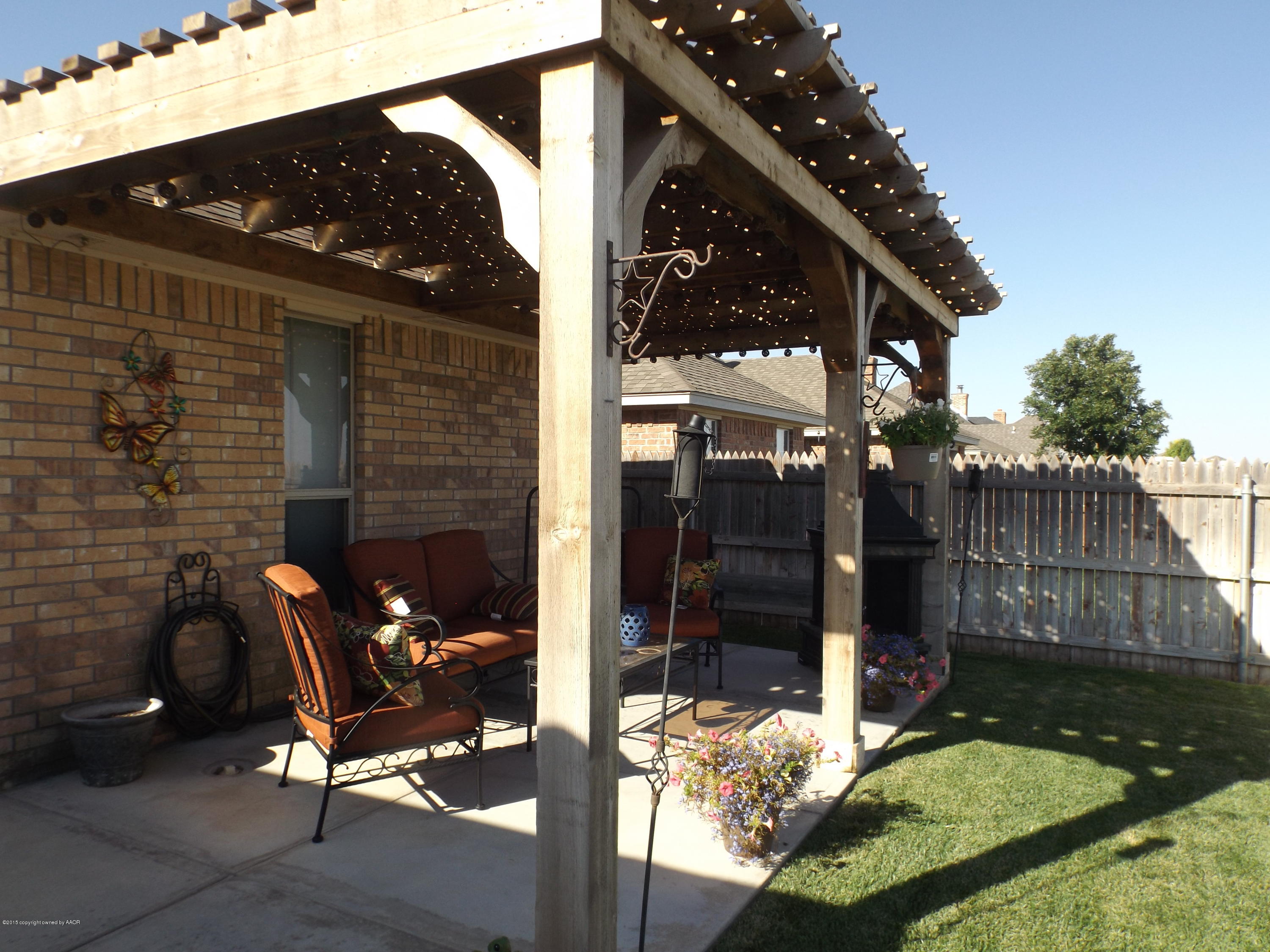 6917 Thunder Road Amarillo, TX 79119 - Photo 14 of 26 pergola in backyard