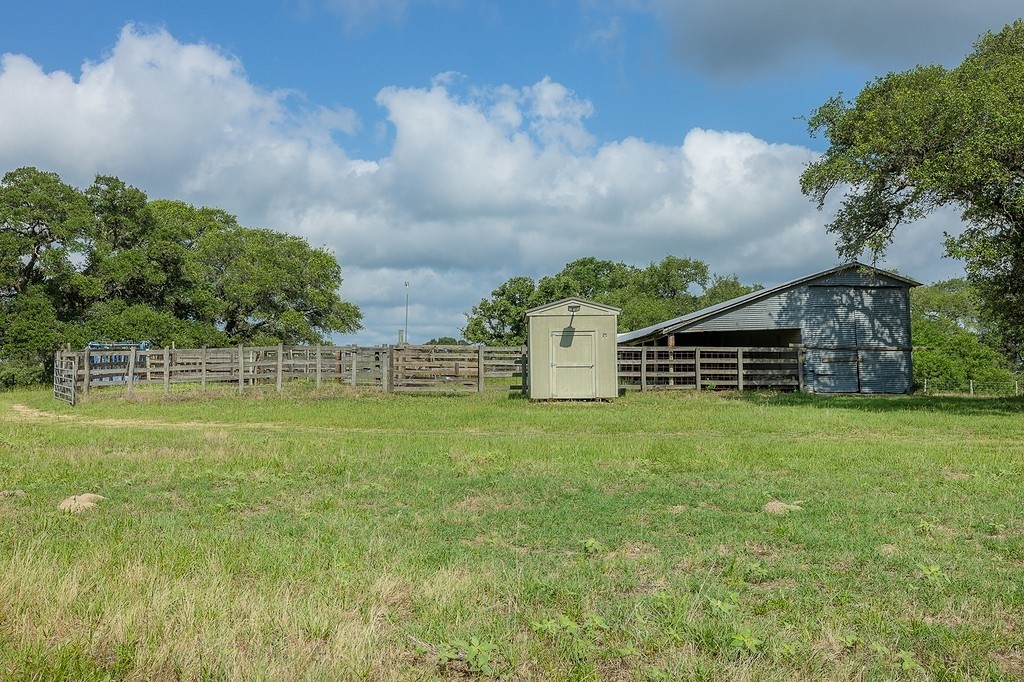 1561 Cr 154 Road Weimar, TX 78962 - Photo 13 of 46 a view of a swimming pool with a garden