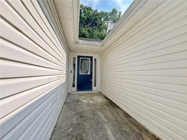 a view of a back yard of the house