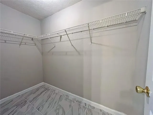 a view of a room with racks on the wall