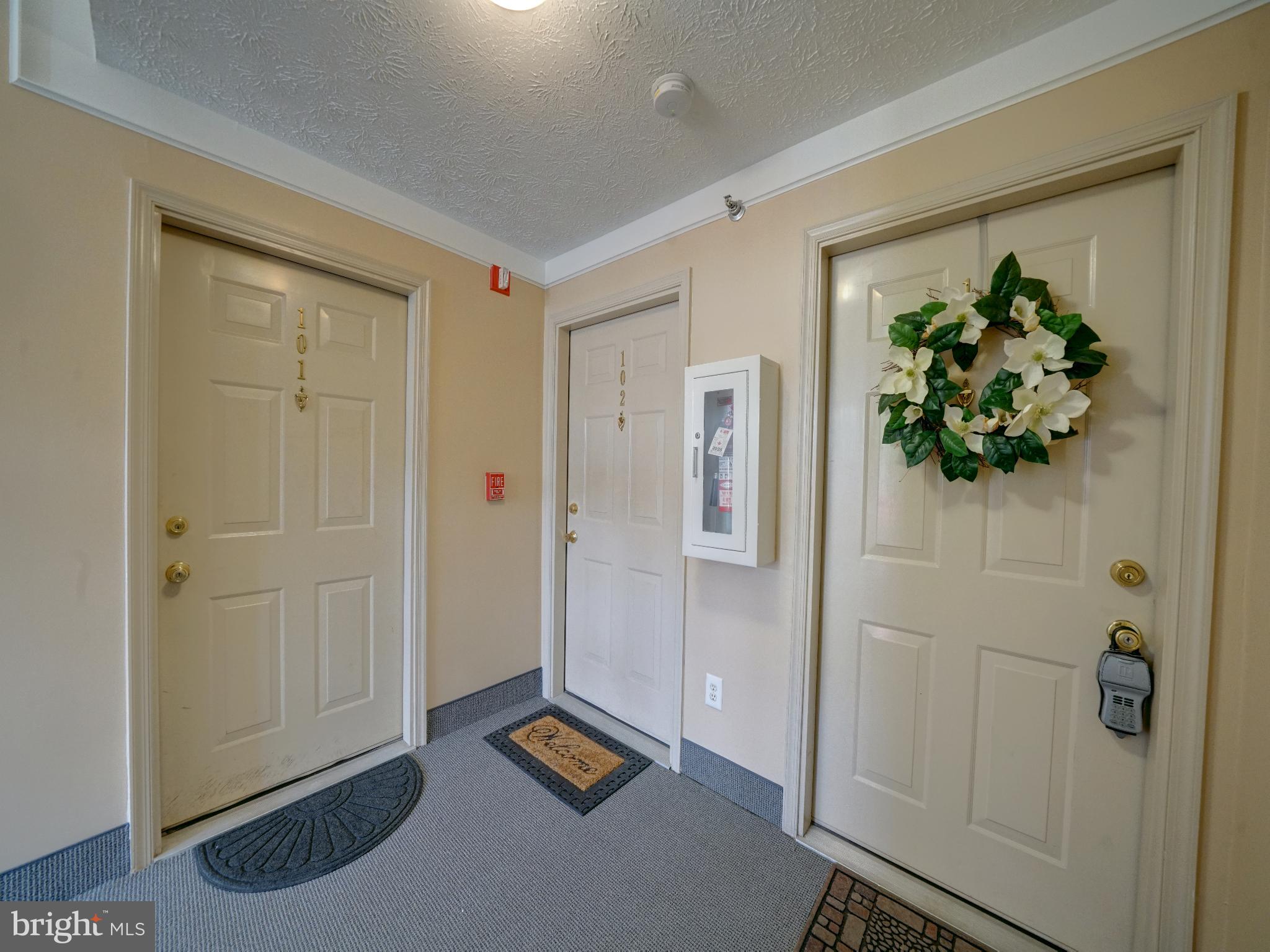 693 Winding Stream Way, Unit 103 Odenton, MD 21113 - Photo 25 of 26 a view of a hallway with closet