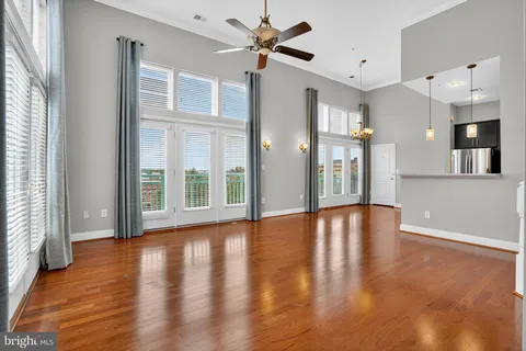 a view of an entryway with wooden floor