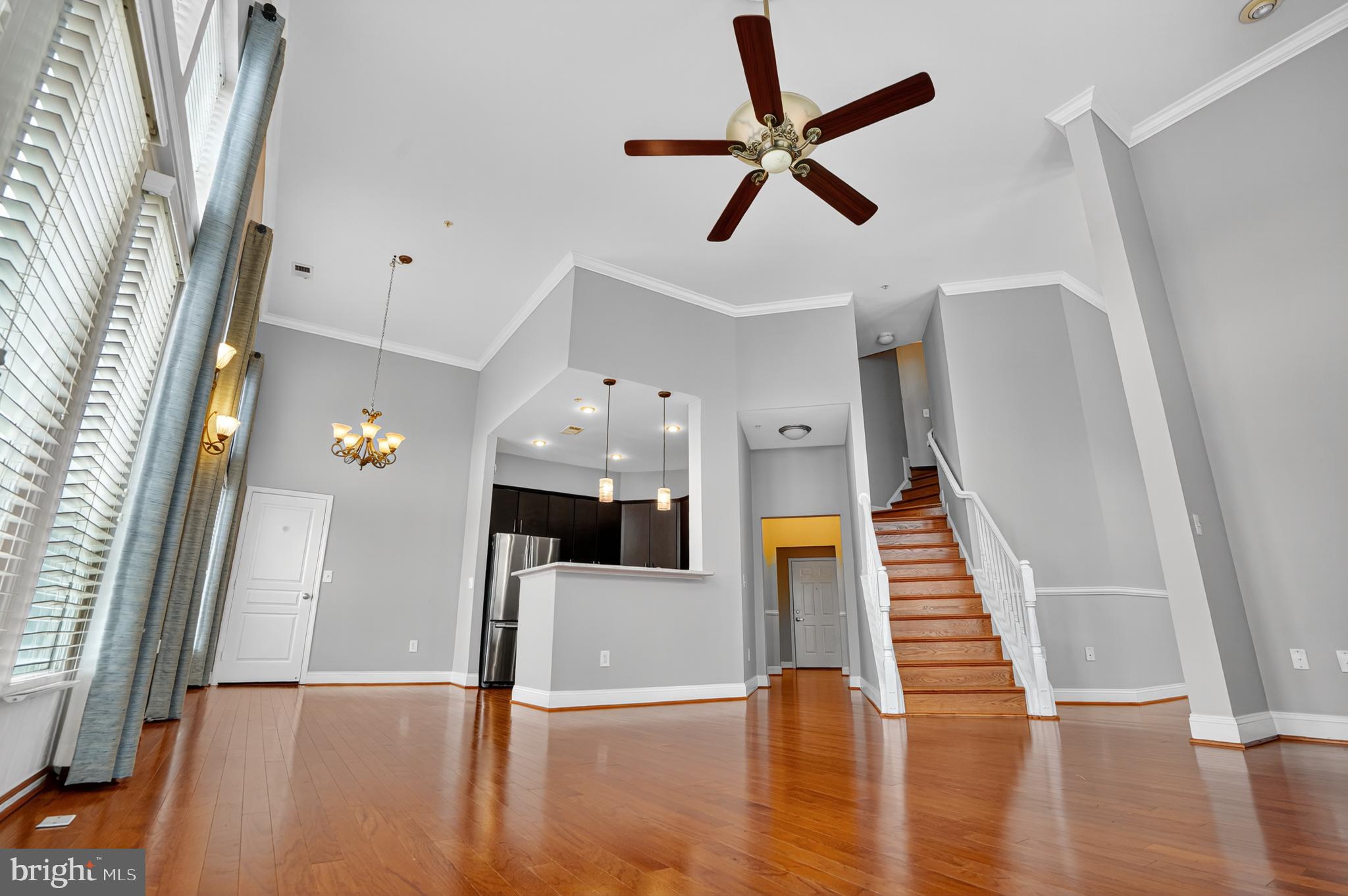 12000 Market Street, Unit 490 Reston, VA 20190 - Photo 17 of 43 Spacious living area with elegant design.