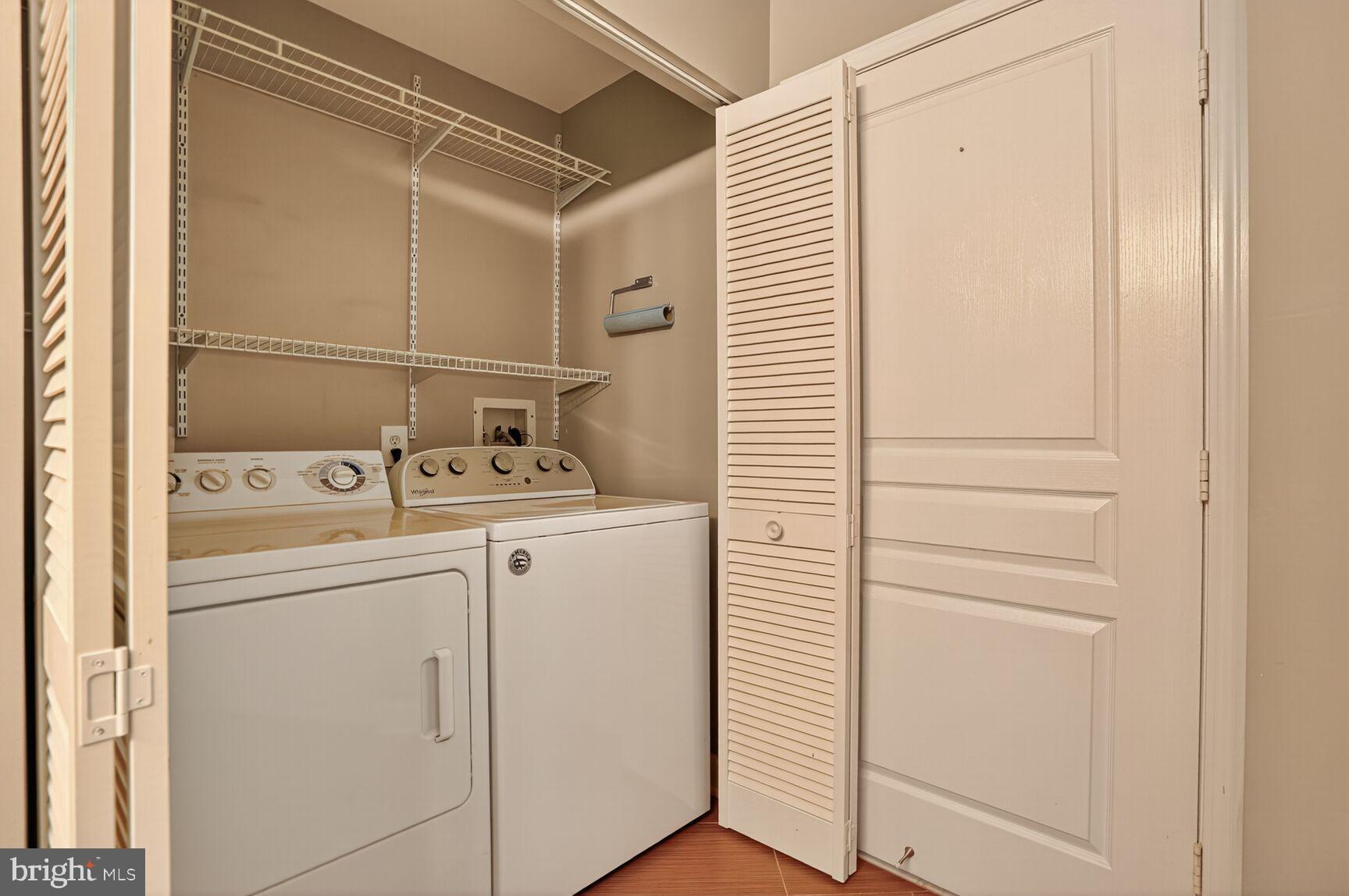 12000 Market Street, Unit 490 Reston, VA 20190 - Photo 24 of 43 Efficient laundry space with ample storage.