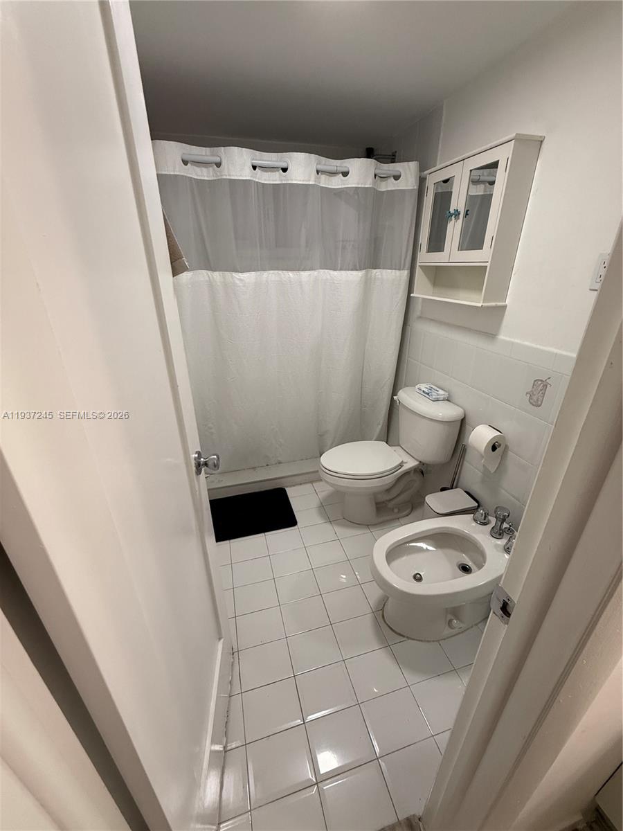 3262 West 70th Street, Unit 101 Hialeah, FL 33018 - Photo 15 of 20 a bathroom with a sink and toilet