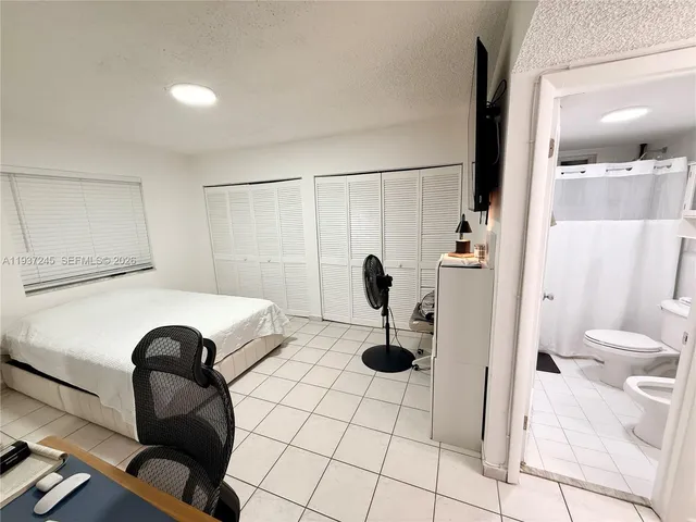 a view of living room with furniture and window