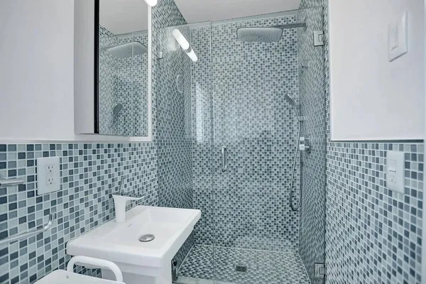 a bedroom with two beds and a painting on the wall