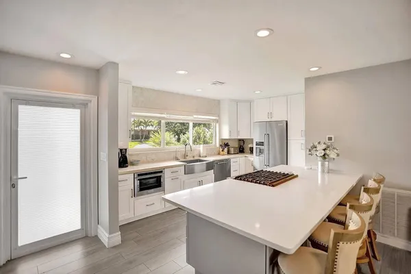 a view of a living room and dining room