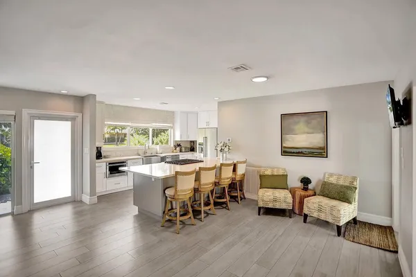 a view of a living room and dining room