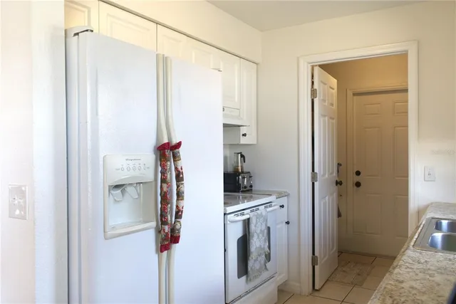 a bathroom with a shower and a sink