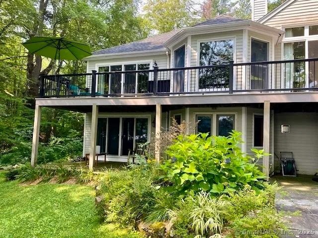 front view of a building with a garden