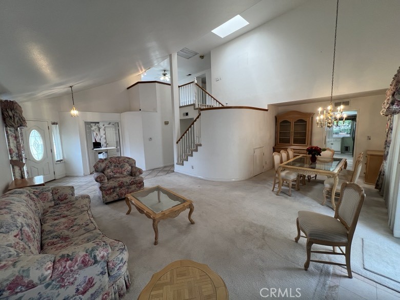 25225 Sagecrest Circle Stevenson Ranch, CA 91381 - Photo 16 of 50 Spacious Living room and dinning room. Wonderful vaulted ceiling with skylight and whole house fan.