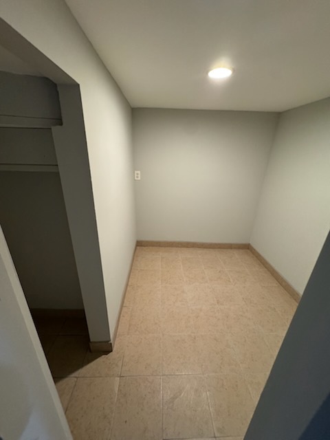 4426 South Talman Avenue, Unit G Chicago, IL 60632 - Photo 6 of 11 wooden floor in an empty room with a window