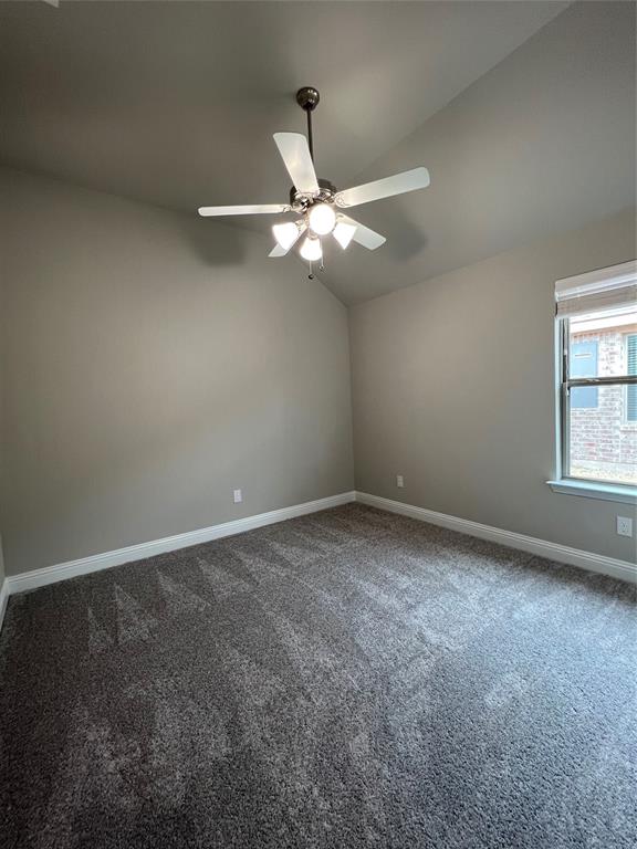 277 Eagle Ridge Forney, TX 75126 - Photo 18 of 19 Spare room featuring lofted ceiling and carpet