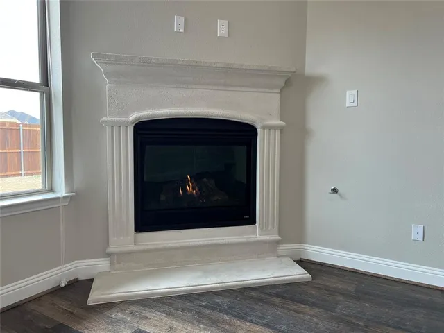 a living room with a fireplace