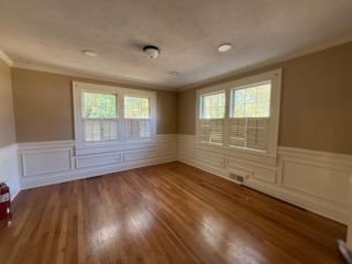 952 Wayside Street Cornelia, GA 30531 - Photo 13 of 50 an empty room with wooden floor and windows