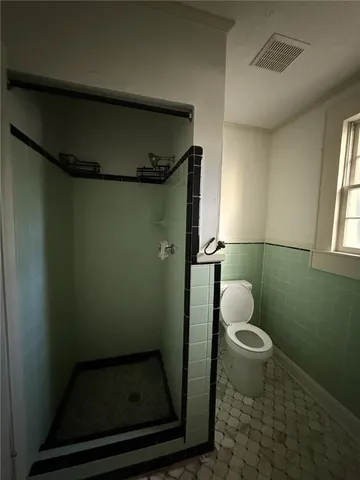 a room with cabinets and stairs