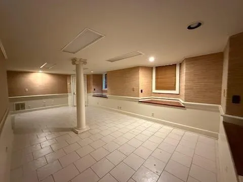 a view of a refrigerator and window