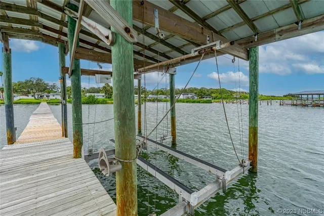 a view of a balcony with wooden floor