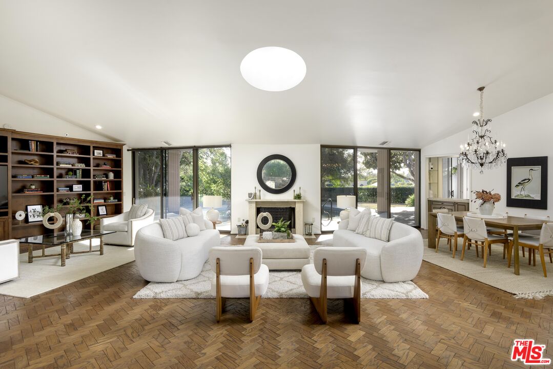 2141 10 Acre Road Santa Barbara, CA 93108 - Photo 5 of 21 a living room with furniture a rug and a floor to ceiling window