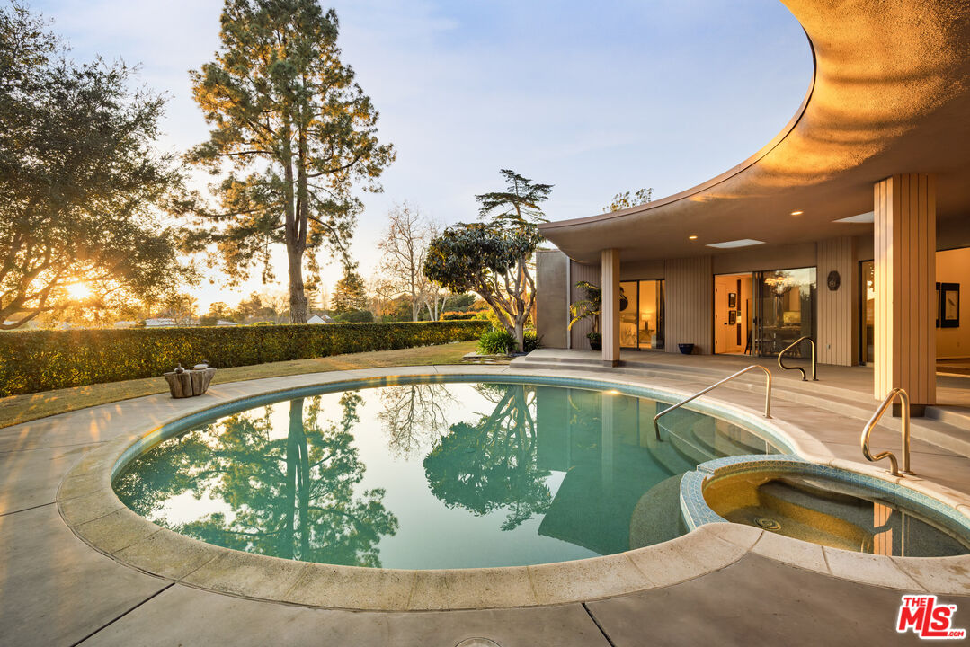 2141 10 Acre Road Santa Barbara, CA 93108 - Photo 7 of 21 a view of a swimming pool with a lounge chair