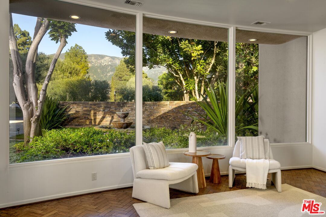 2141 10 Acre Road Santa Barbara, CA 93108 - Photo 10 of 21 a living room with patio furniture and a large window