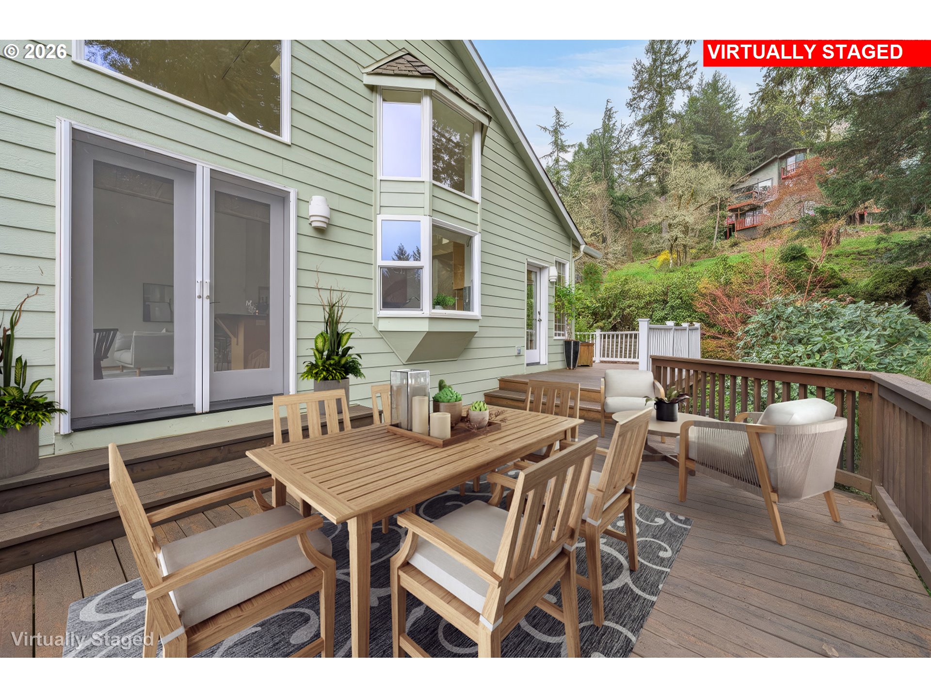 653 Brookside Drive Eugene, OR 97405 - Photo 15 of 48 a view of a patio with a table and chairs