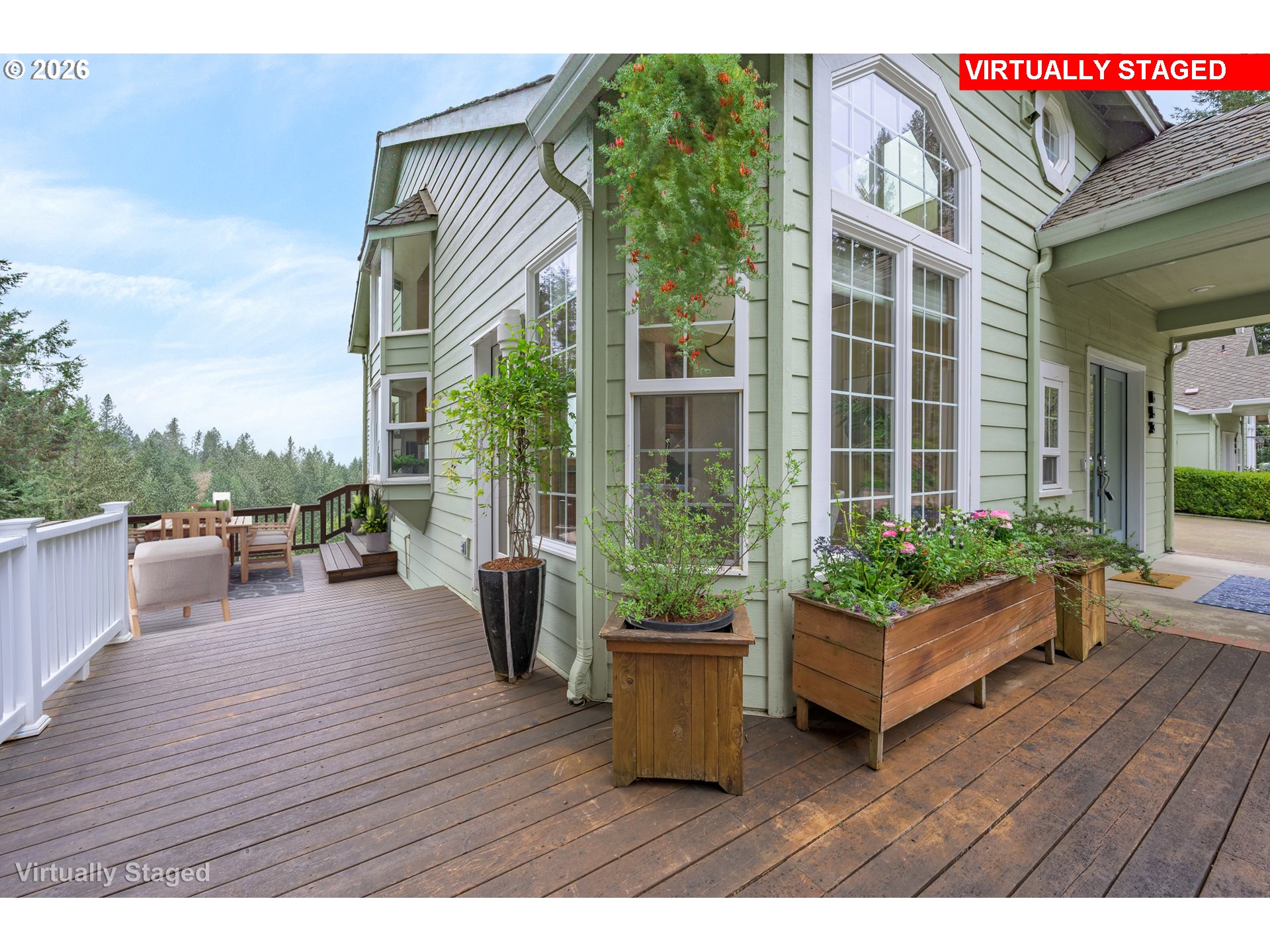 653 Brookside Drive Eugene, OR 97405 - Photo 22 of 48 a view of a terrace with couches and potted plants