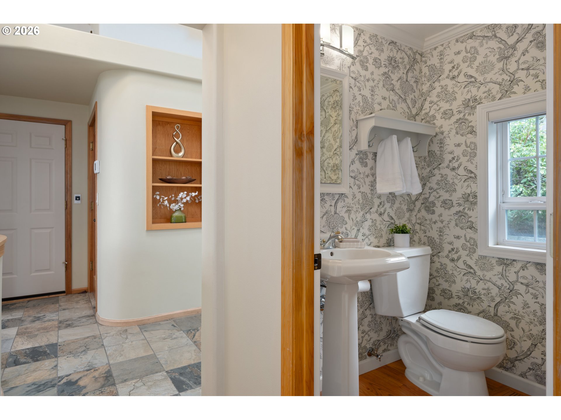 653 Brookside Drive Eugene, OR 97405 - Photo 23 of 48 a bathroom with a toilet a sink and a window