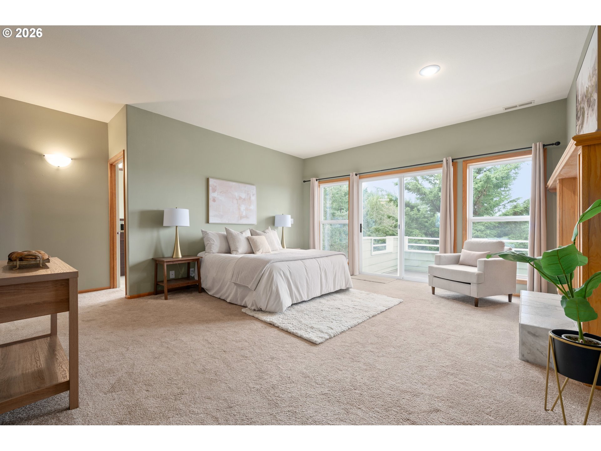 653 Brookside Drive Eugene, OR 97405 - Photo 25 of 48 a bedroom with a bed and a couch