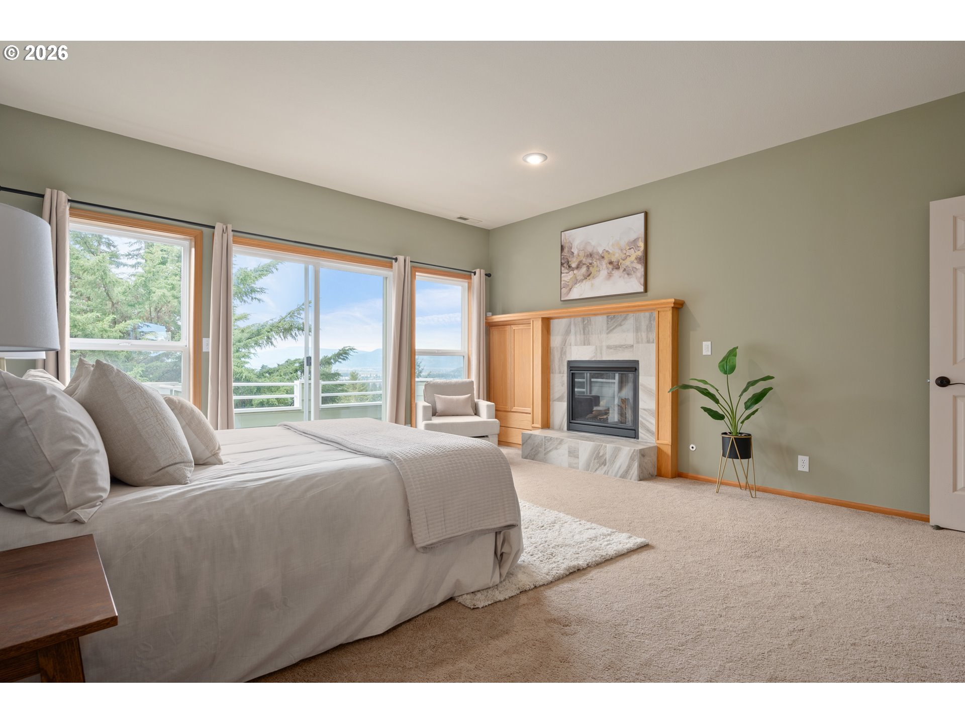 653 Brookside Drive Eugene, OR 97405 - Photo 26 of 48 a bed room with a bed and a large window