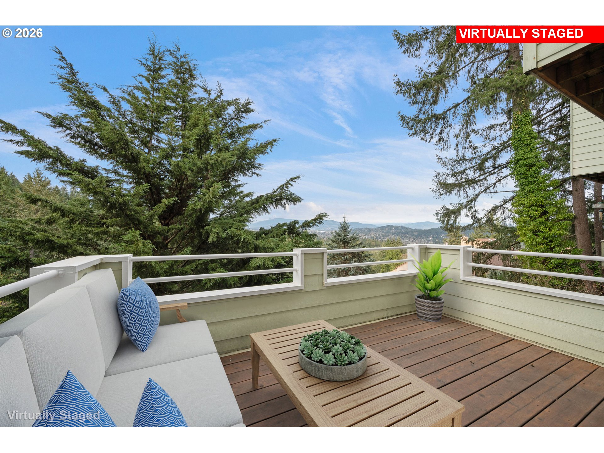 653 Brookside Drive Eugene, OR 97405 - Photo 27 of 48 a view of roof deck with dining table and chairs with wooden floor and fence