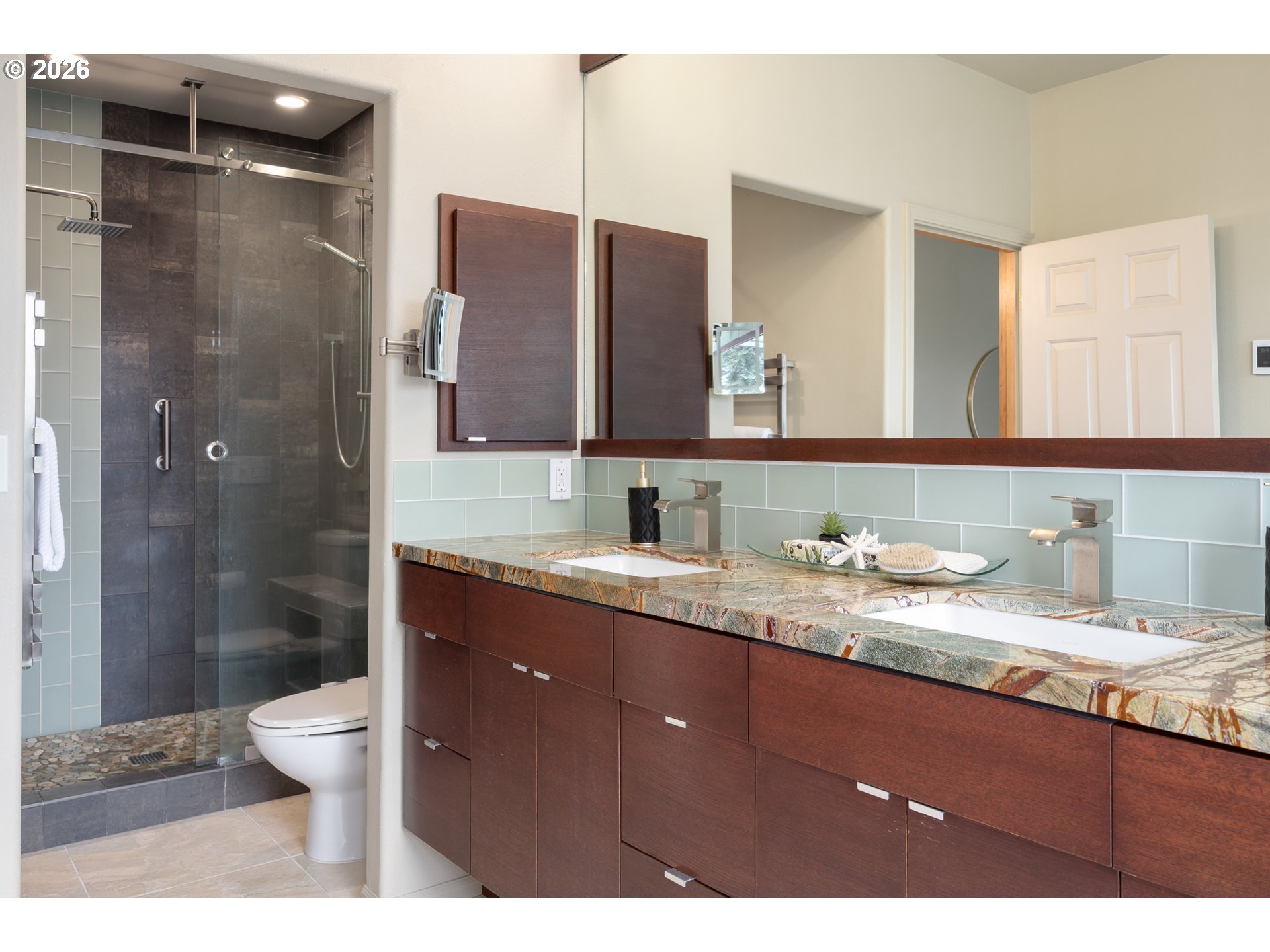 653 Brookside Drive Eugene, OR 97405 - Photo 30 of 48 a bathroom with a granite countertop sink toilet a large mirror and shower