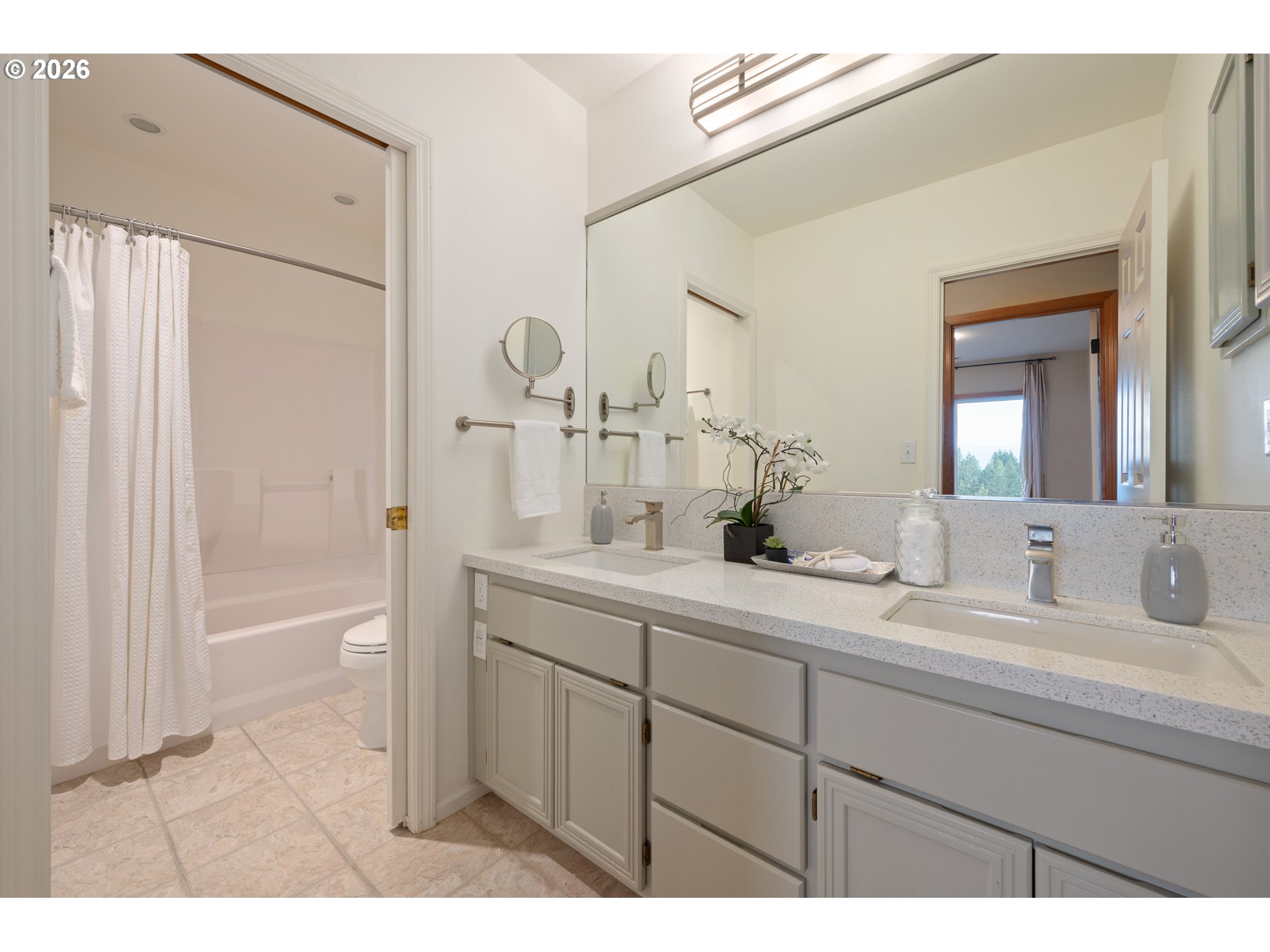 653 Brookside Drive Eugene, OR 97405 - Photo 36 of 48 a bathroom with a double vanity sink mirror double and shower