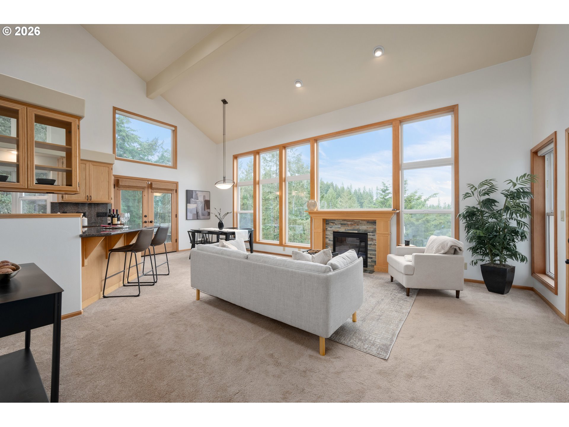 653 Brookside Drive Eugene, OR 97405 - Photo 5 of 48 a living room with furniture and a large window
