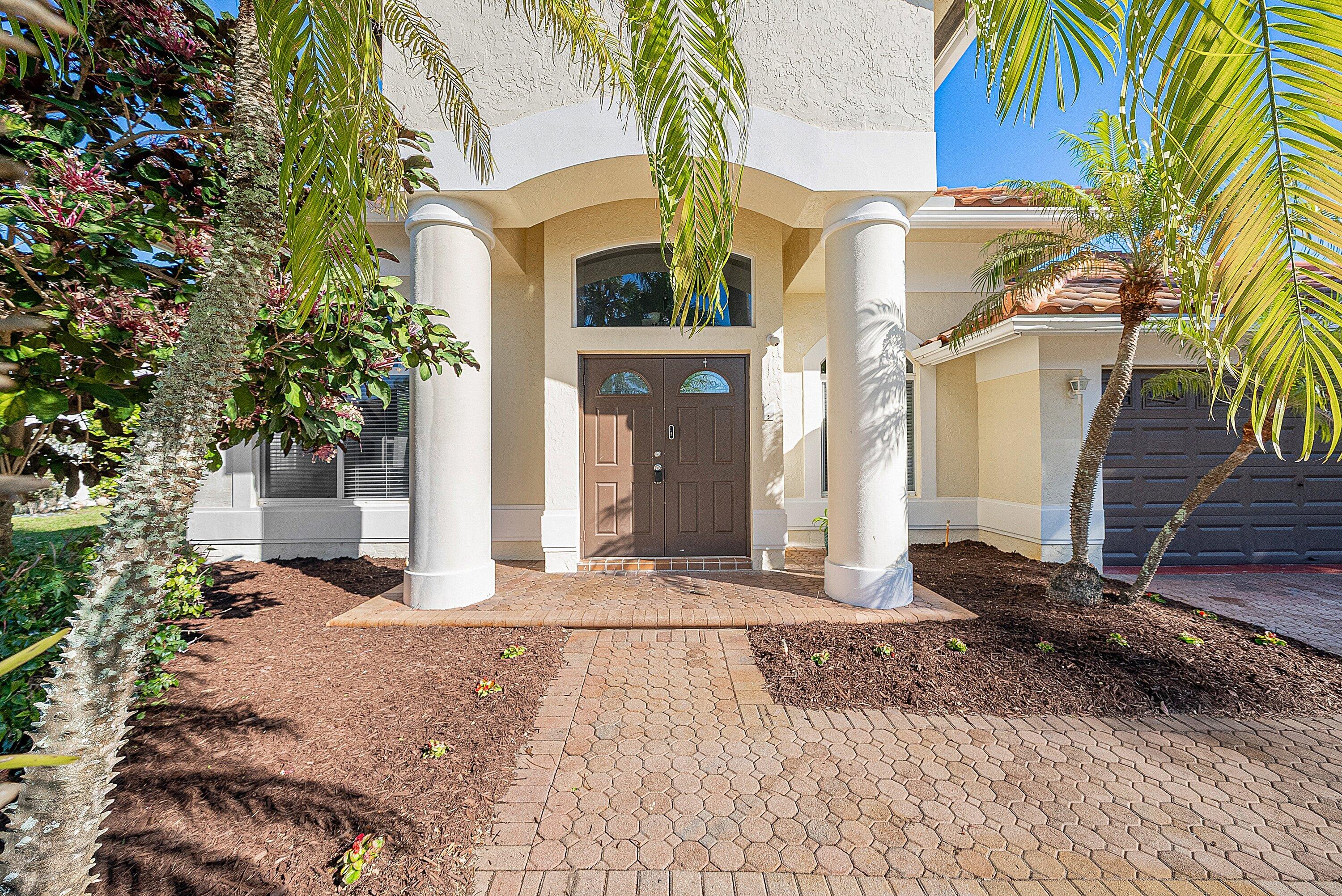 19712 Dinner Key Drive Boca Raton, FL 33498 - Photo 11 of 28 a view of a house with a yard