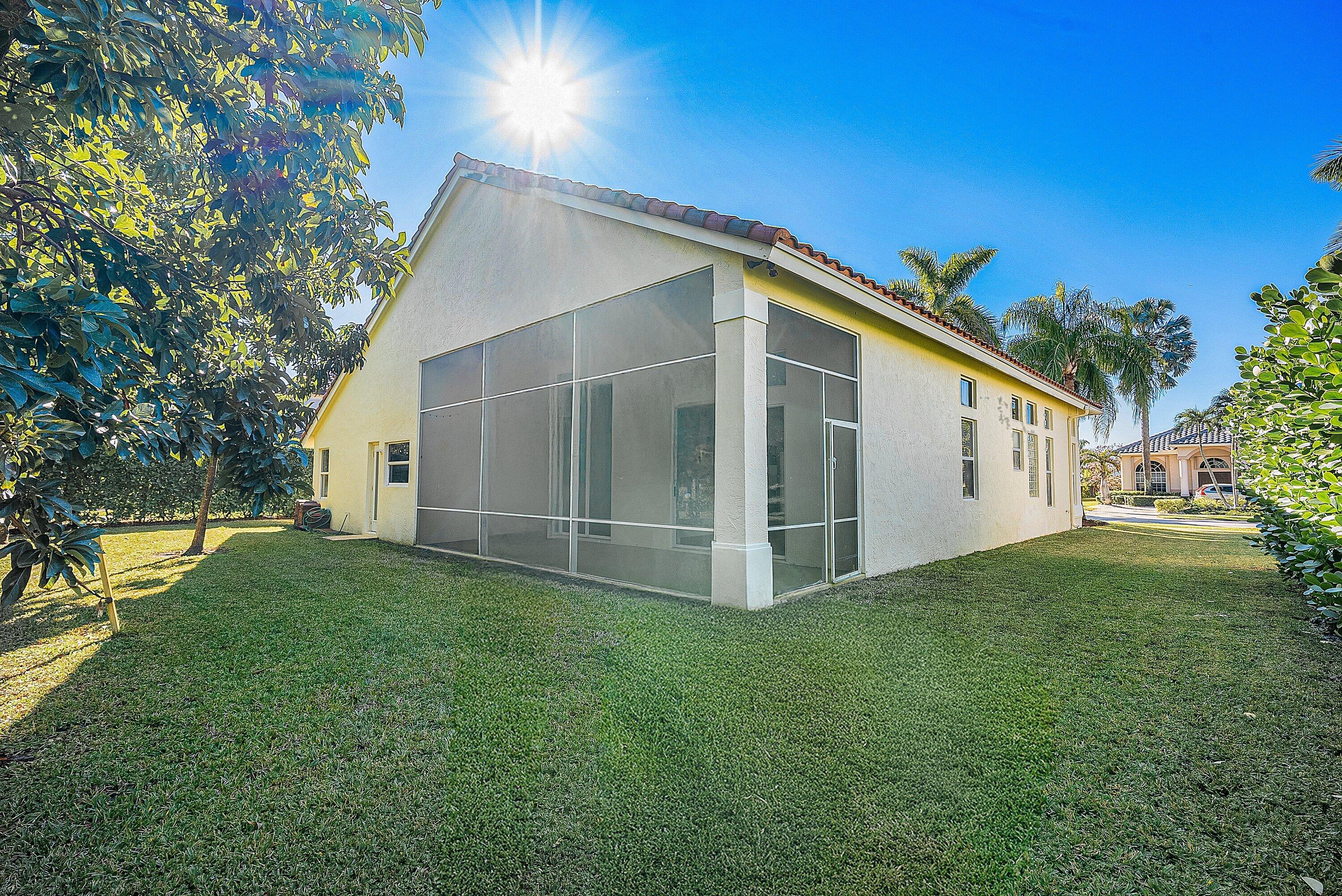 19712 Dinner Key Drive Boca Raton, FL 33498 - Photo 27 of 28 a view of a house with backyard