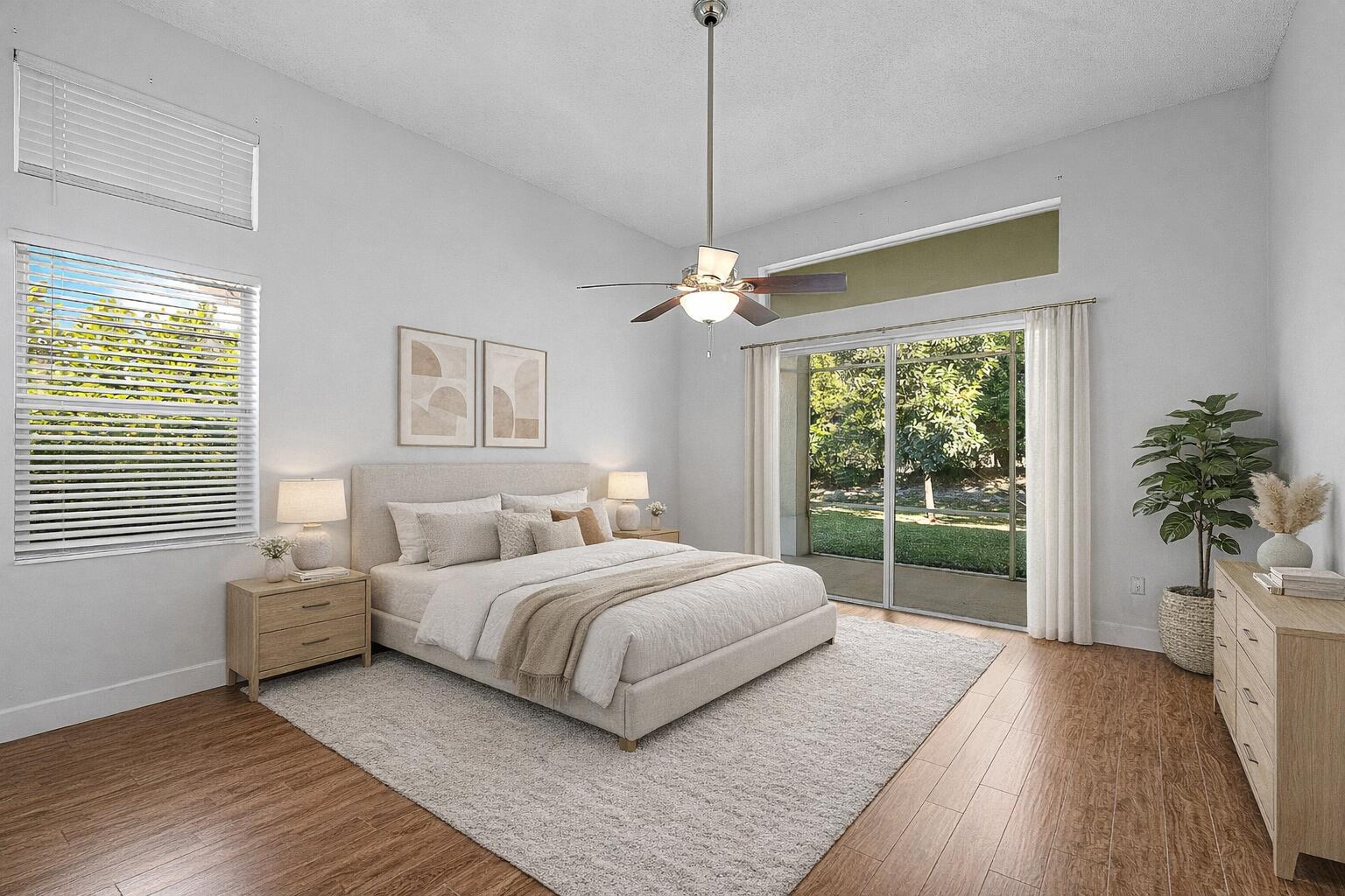 19712 Dinner Key Drive Boca Raton, FL 33498 - Photo 4 of 28 a bedroom with a large bed and a window