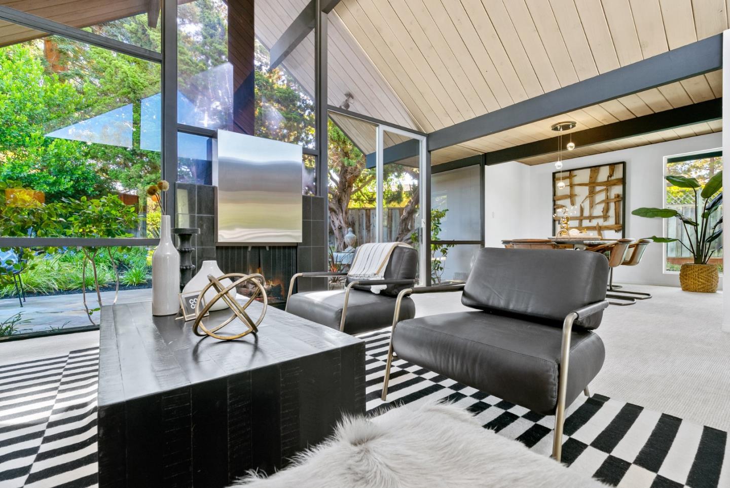 958 Eichler Drive Mountain View, CA 94040 - Photo 21 of 62 a living room with furniture and a floor to ceiling window