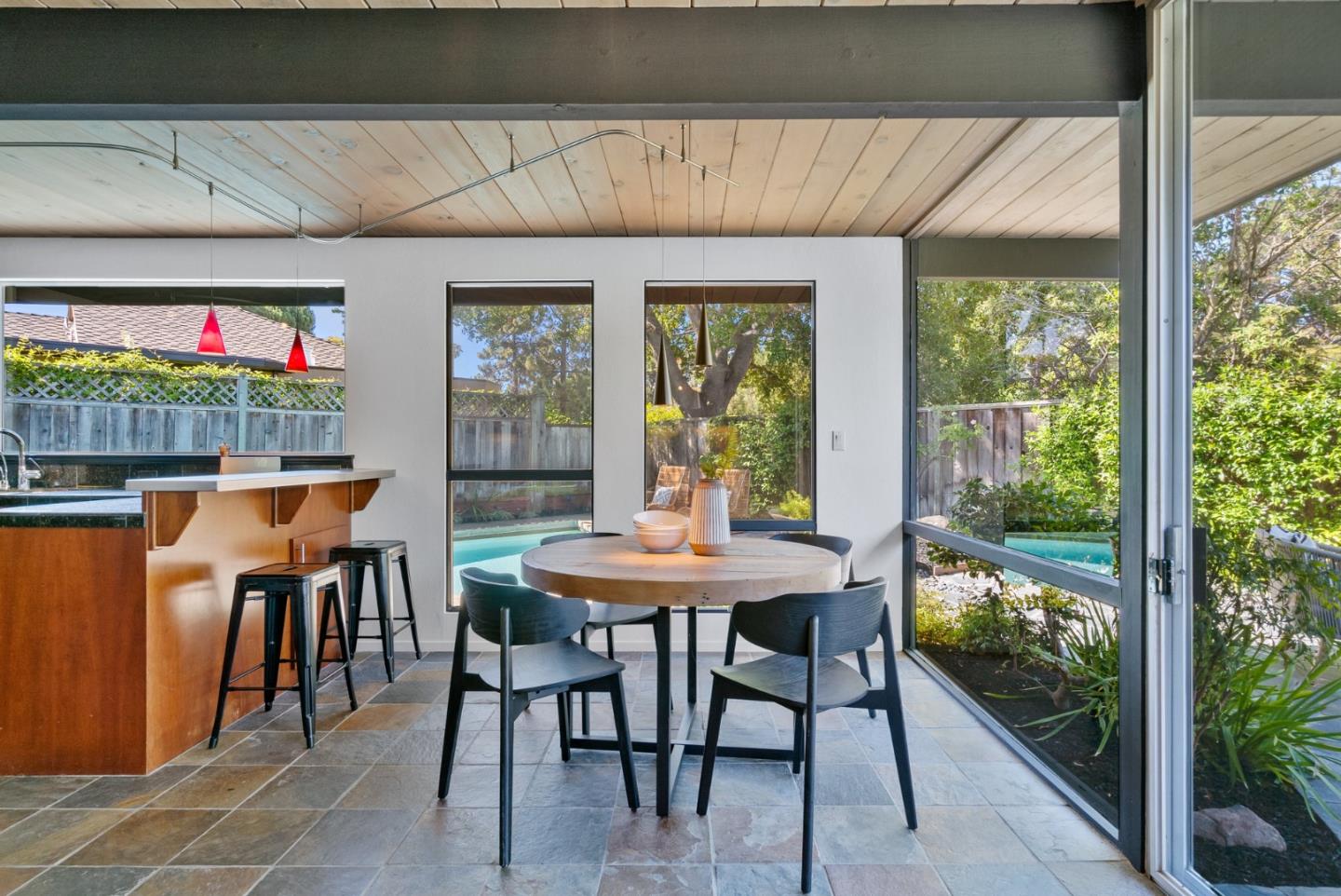 958 Eichler Drive Mountain View, CA 94040 - Photo 27 of 62 a view of a dining room with furniture window and outside view