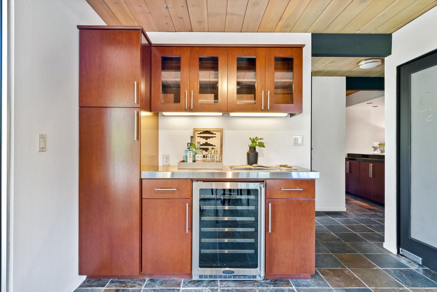 958 Eichler Drive Mountain View, CA 94040 - Photo 30 of 62 a kitchen with a refrigerator and cabinets