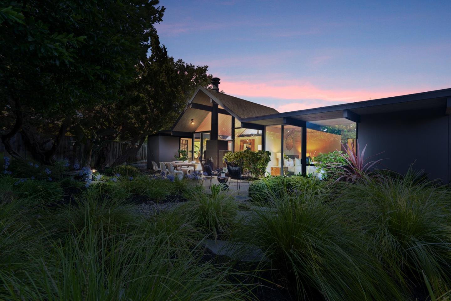958 Eichler Drive Mountain View, CA 94040 - Photo 3 of 62 a backyard of a house with plants and large trees