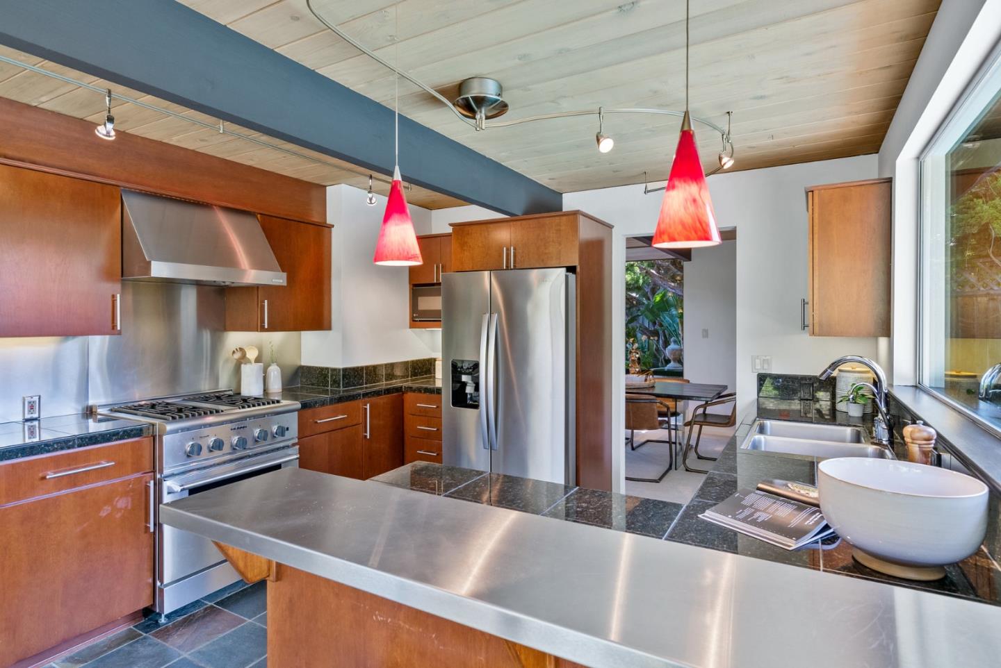 958 Eichler Drive Mountain View, CA 94040 - Photo 32 of 62 a kitchen with stainless steel appliances granite countertop a sink dishwasher stove and refrigerator