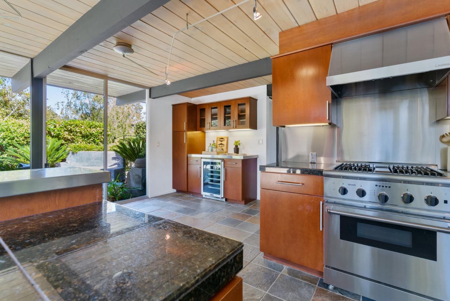 958 Eichler Drive Mountain View, CA 94040 - Photo 33 of 62 a kitchen with stove and cabinets