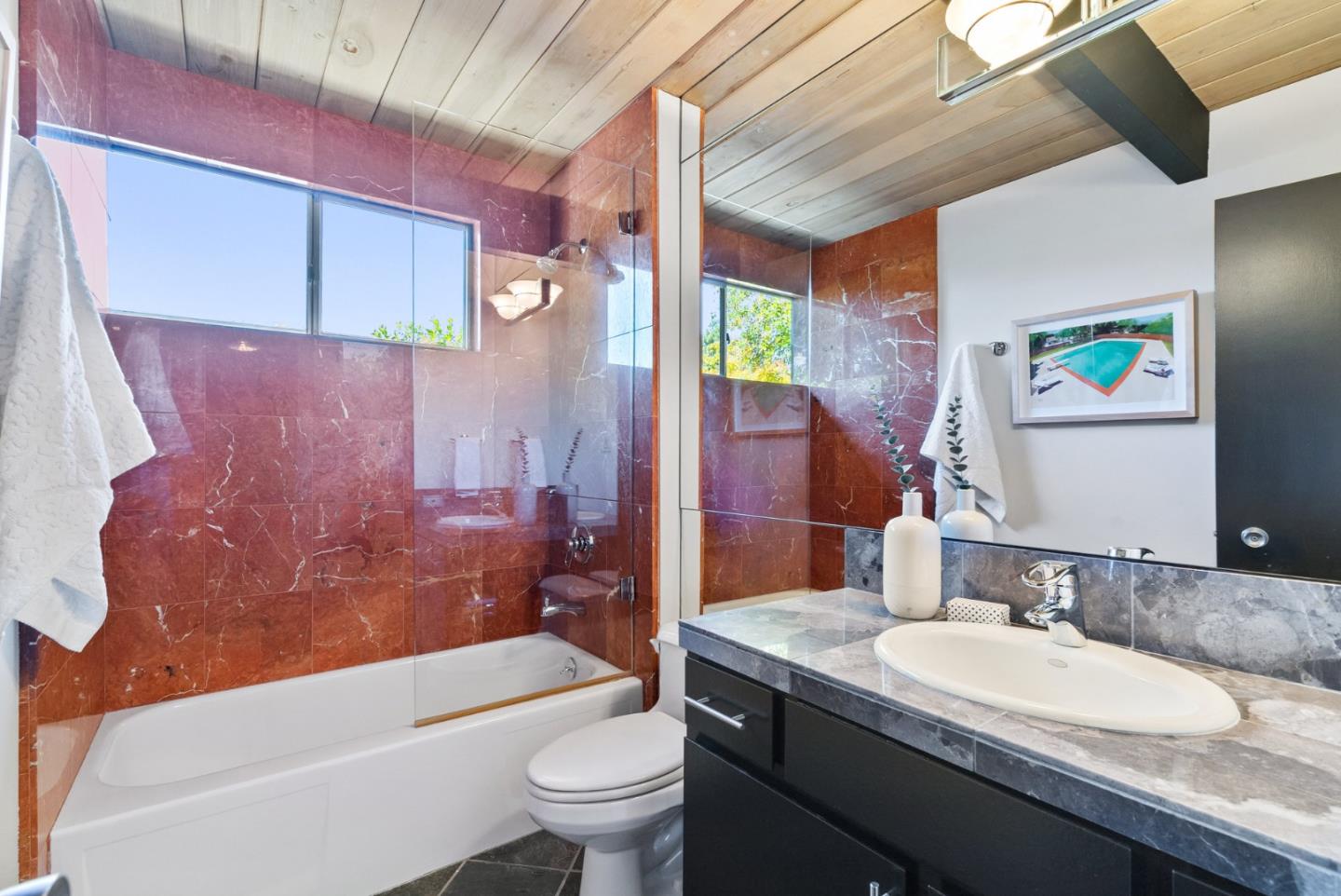 958 Eichler Drive Mountain View, CA 94040 - Photo 42 of 62 a bathroom with a granite countertop bathtub sink vanity mirror and toilet