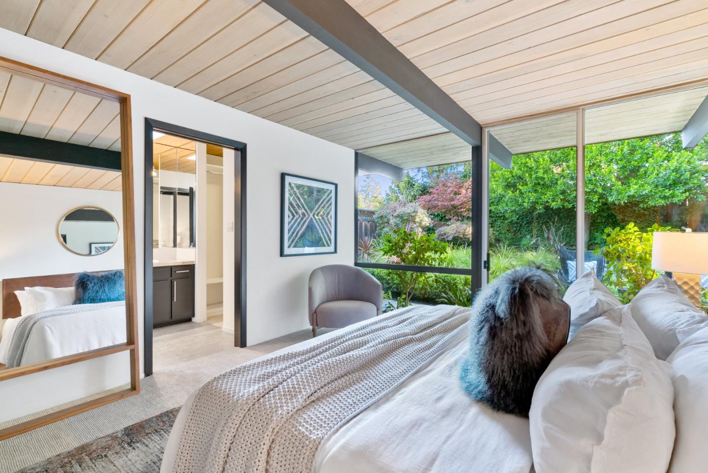 958 Eichler Drive Mountain View, CA 94040 - Photo 44 of 62 a bedroom with a bed and a large window