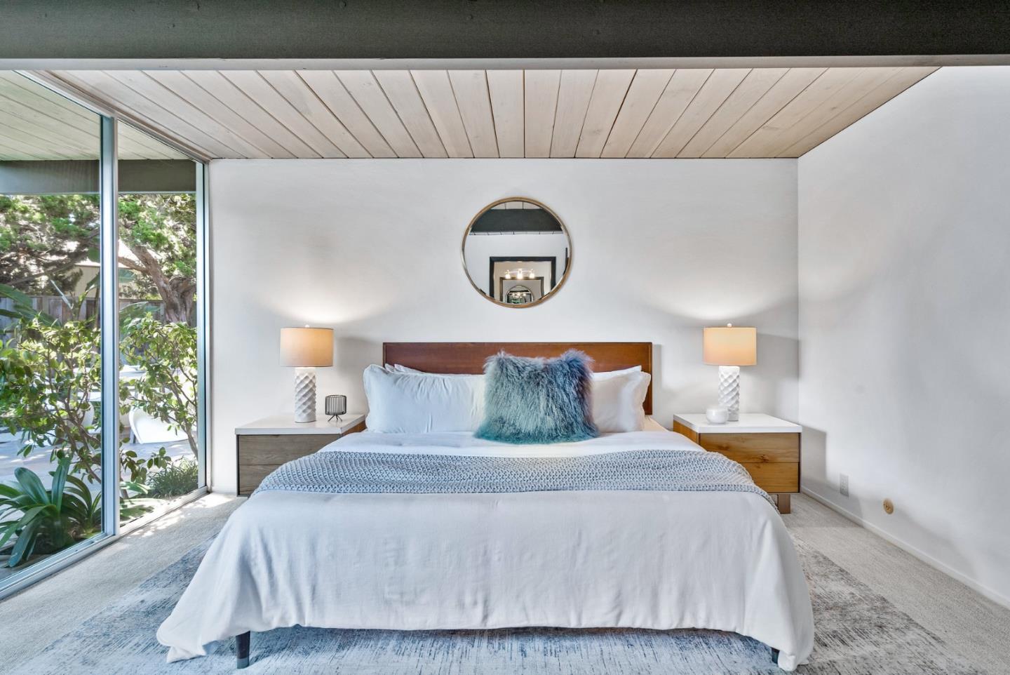 958 Eichler Drive Mountain View, CA 94040 - Photo 45 of 62 a bedroom with a bed and a night stand